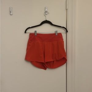 Orange speed up shorts tall size 4